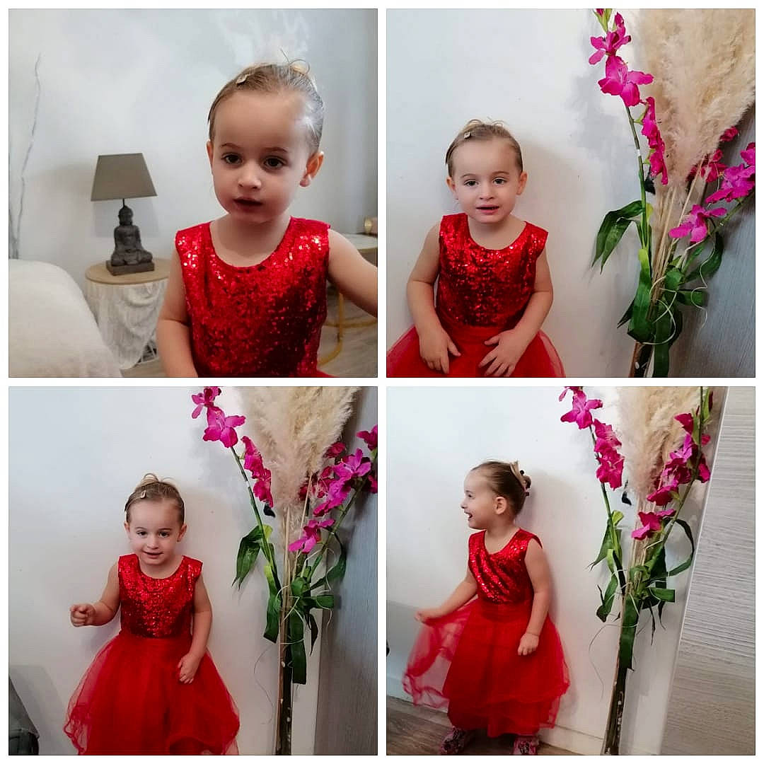 Layana participe au concours pour gagner de l'argent avec cette photo : clothing, collar, facial_expression, fashion, flower, happy, joy, magenta, neck, outerwear, person, petal, photograph, pink, plant, product, purple, red, sleeve, terrestrial_plant