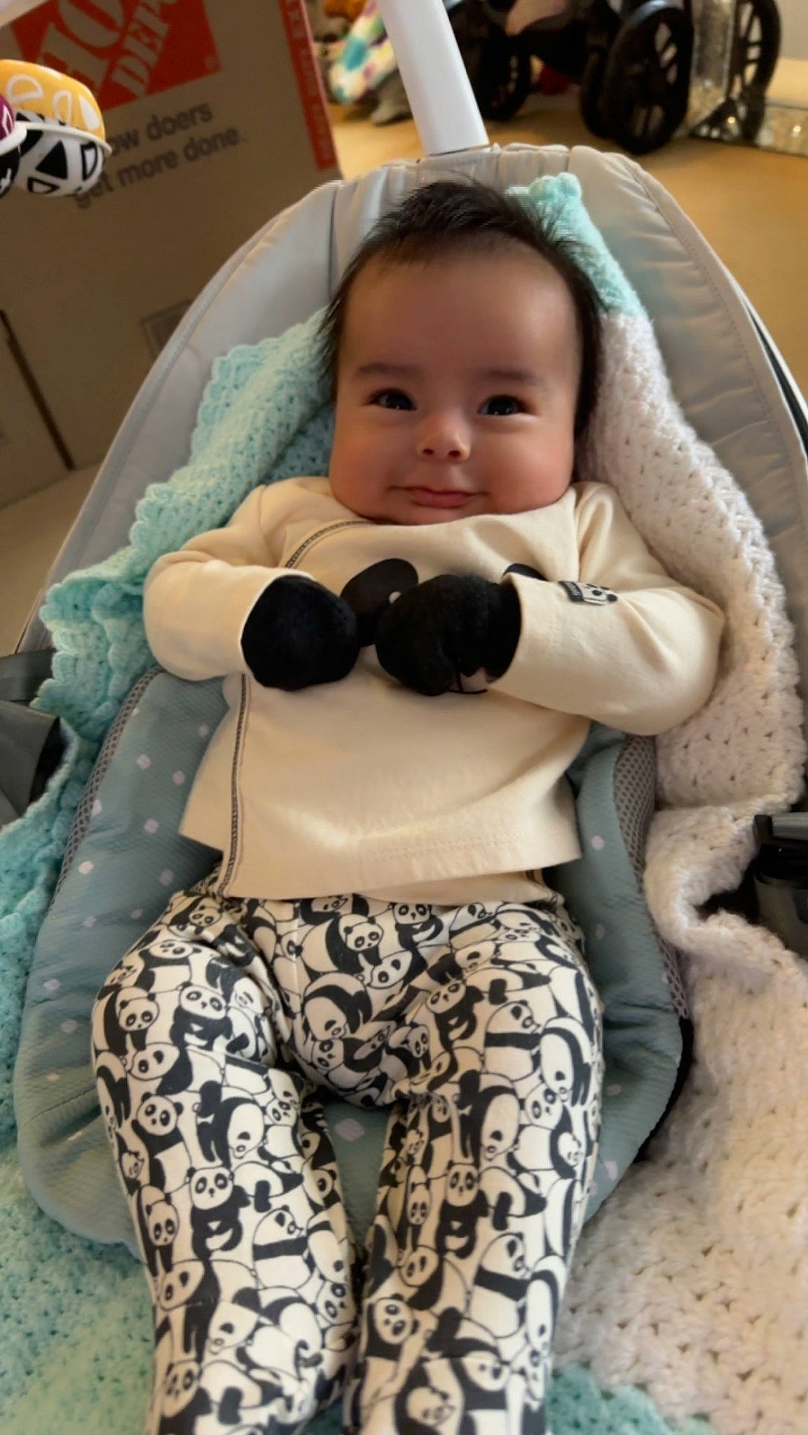 Milan joined the competition — help win amazing prizes! abdomen, baby, baby_products, baby_toddler_clothing, black_hair, child, comfort, eyewear, hairstyle, human_leg, joy, pattern, person, personal_protective_equipment, sitting, skin, sleeve, smile, textile, thigh