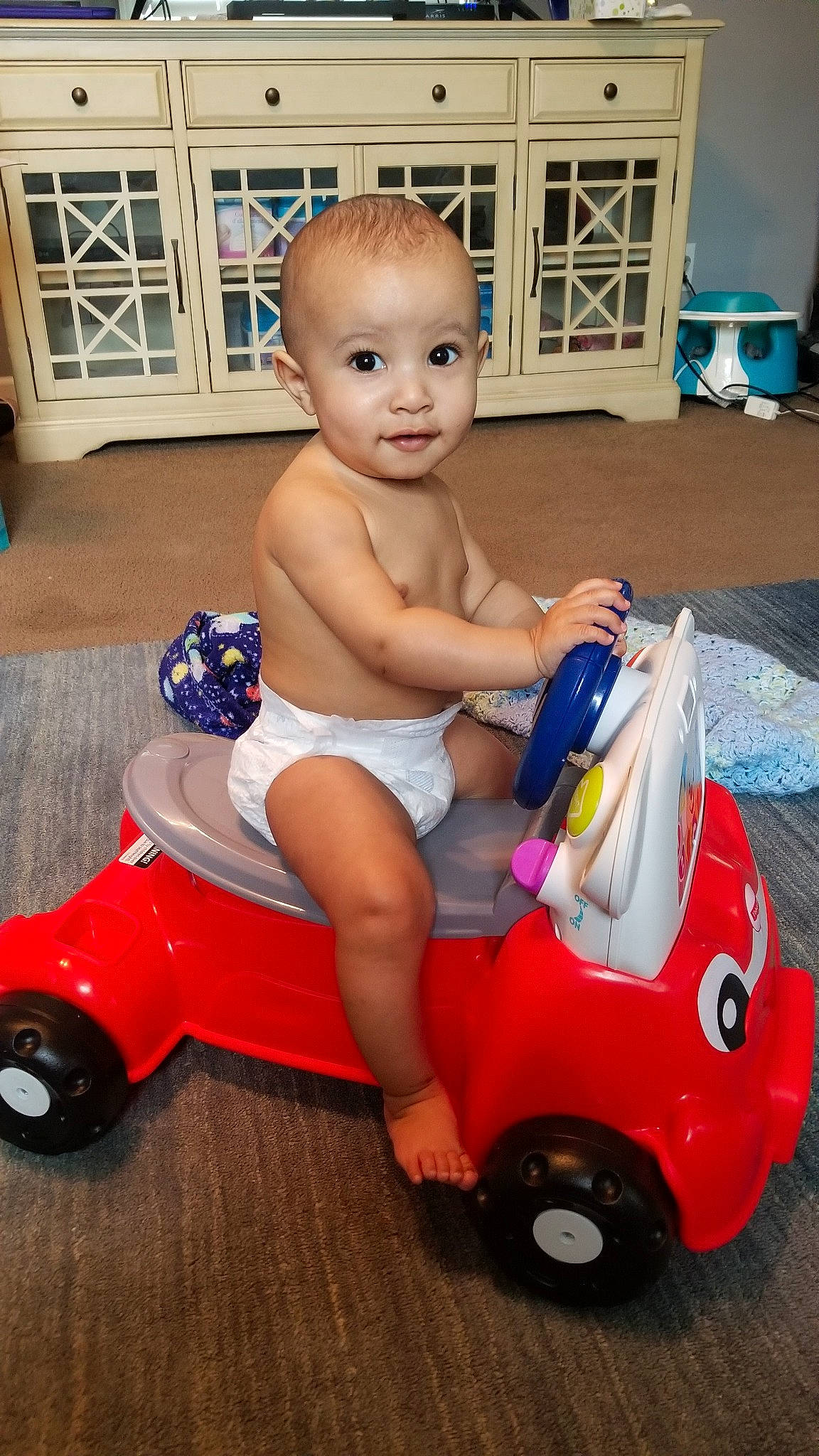 Andre is registered to the contest to win money with this photo: baby, baby_products, baby_toys, car, child, fun, model_car, person, play, product, riding_toy, toddler, toy, toy_vehicle, vacation, vehicle