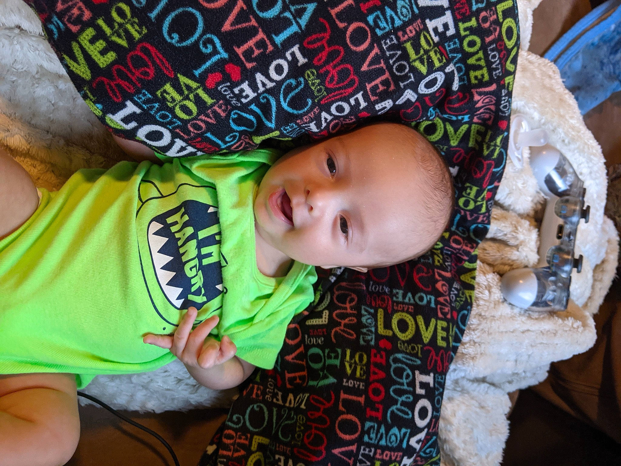 Tobias is registered to the contest to win money with this photo: baby, baby_toddler_clothing, cap, cheek, cool, eye, grass, hand, happy, hat, human_body, mouth, nose, person, skin, sleeve, smile, t_shirt, toddler, tree