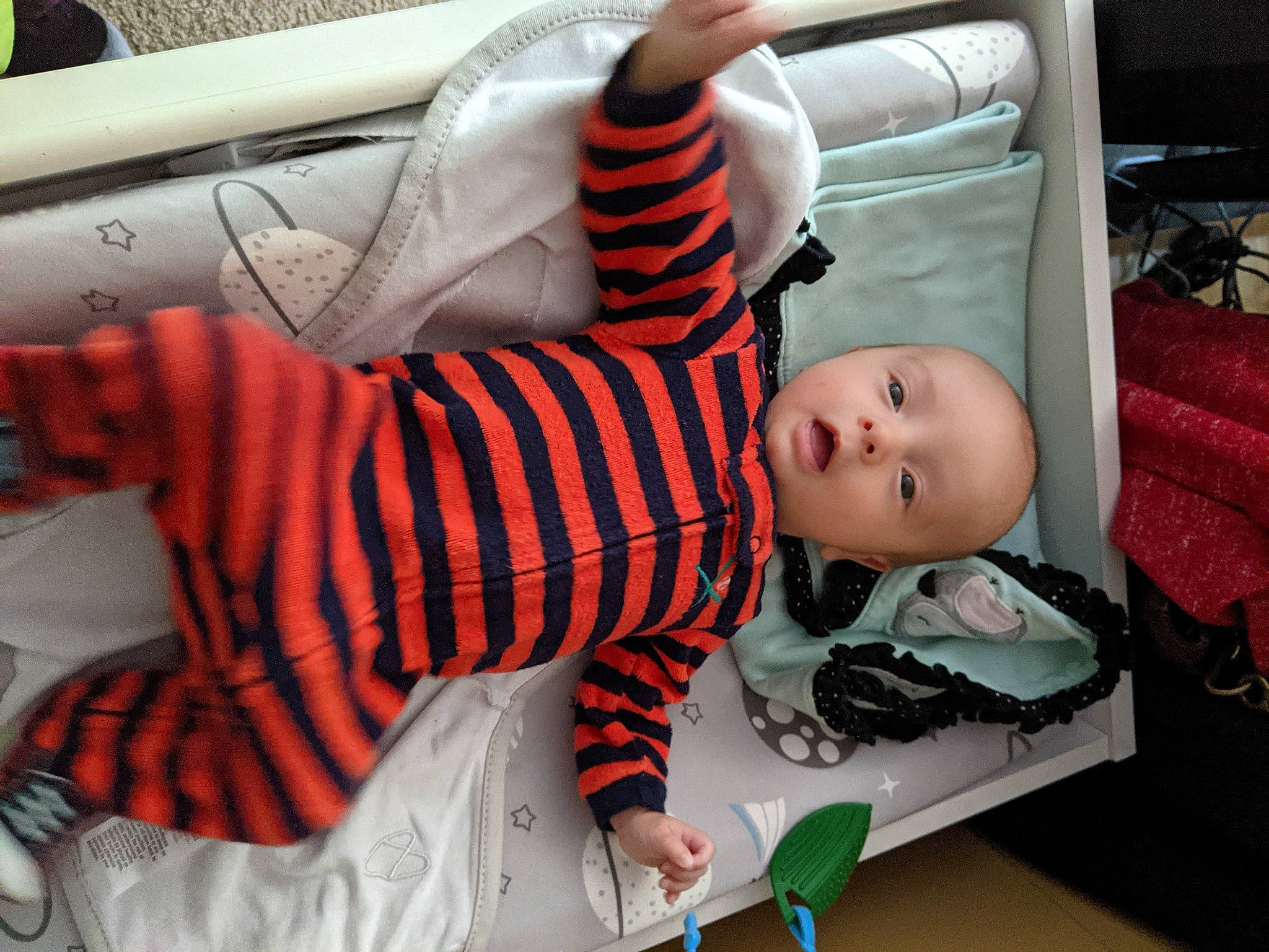 Tobias joined the competition — help win amazing prizes! baby, baby_products, baby_toddler_clothing, carmine, child, comfort, couch, doll, fun, human_leg, orange, pattern, person, product, room, sitting, textile, thigh, toddler, toy