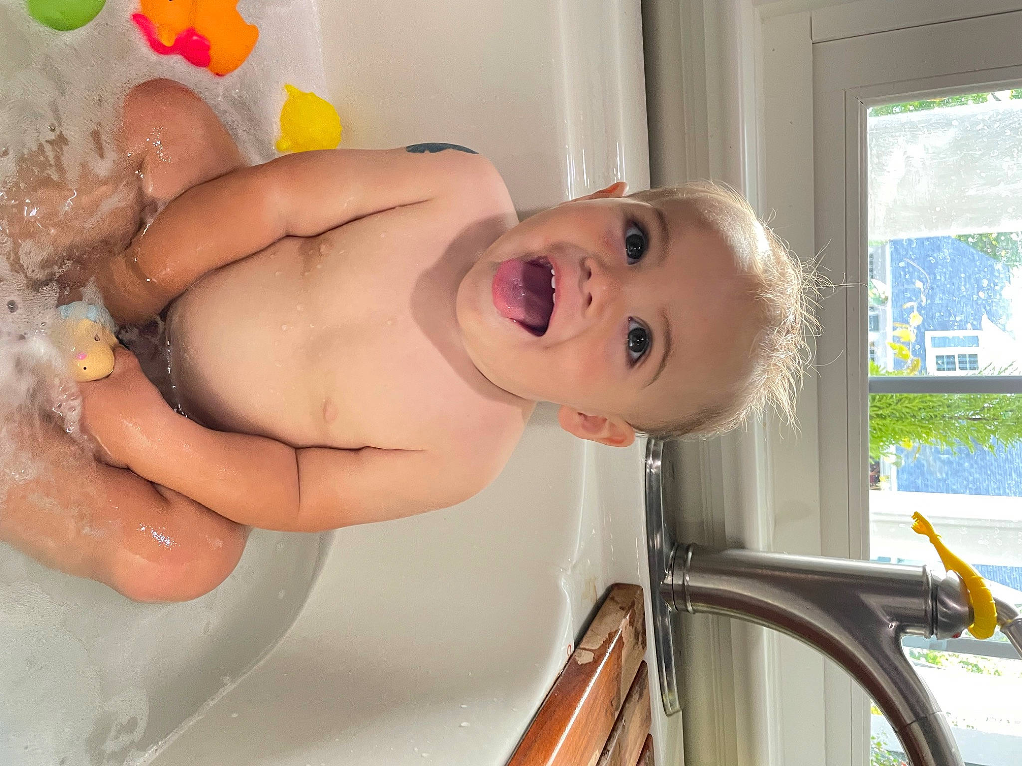 Ethan joined the competition — help win amazing prizes! baby, baby_bathing, bathing, bathroom, bathtub, cheek, finger, fluid, fun, hand, happy, leisure, mouth, muscle, person, skin, smile, stomach, toddler, water