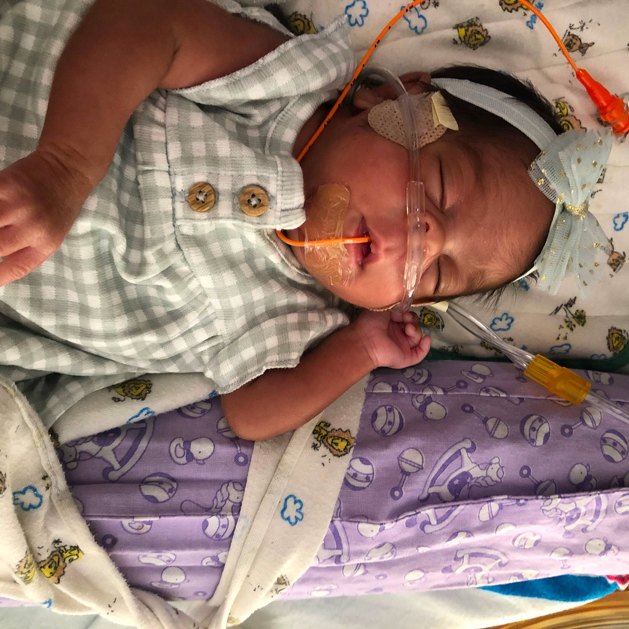 Esme joined the competition — help win amazing prizes! abdomen, baby, baby_products, bedding, child, eyewear, fun, gesture, happy, jewellery, linens, mouth, pattern, person, plaid, purple, sleeve, t_shirt, textile, toddler