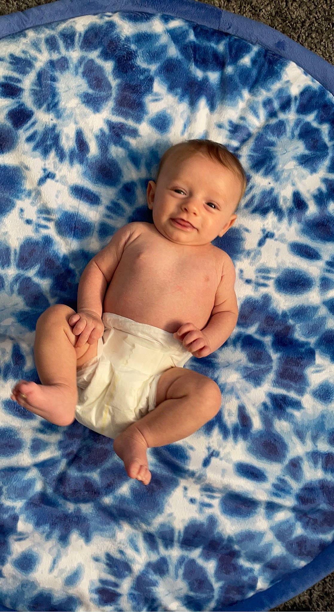 Jaxxon is registered to the contest to win money with this photo: arm, azure, baby, baby_toddler_clothing, barefoot, child, comfort, finger, flash_photography, fun, grass, happy, people, people_in_nature, person, skin, stomach, summer, textile, toddler