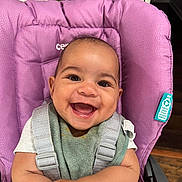 Zen joined the competition — help win amazing prizes! baby, smiling, high_chair, purple, bib, food_stains, happy, infant, child, seatbelt, indoor, person, plant, wooden_floor, clothing, face, arms, closeup, cute, expression