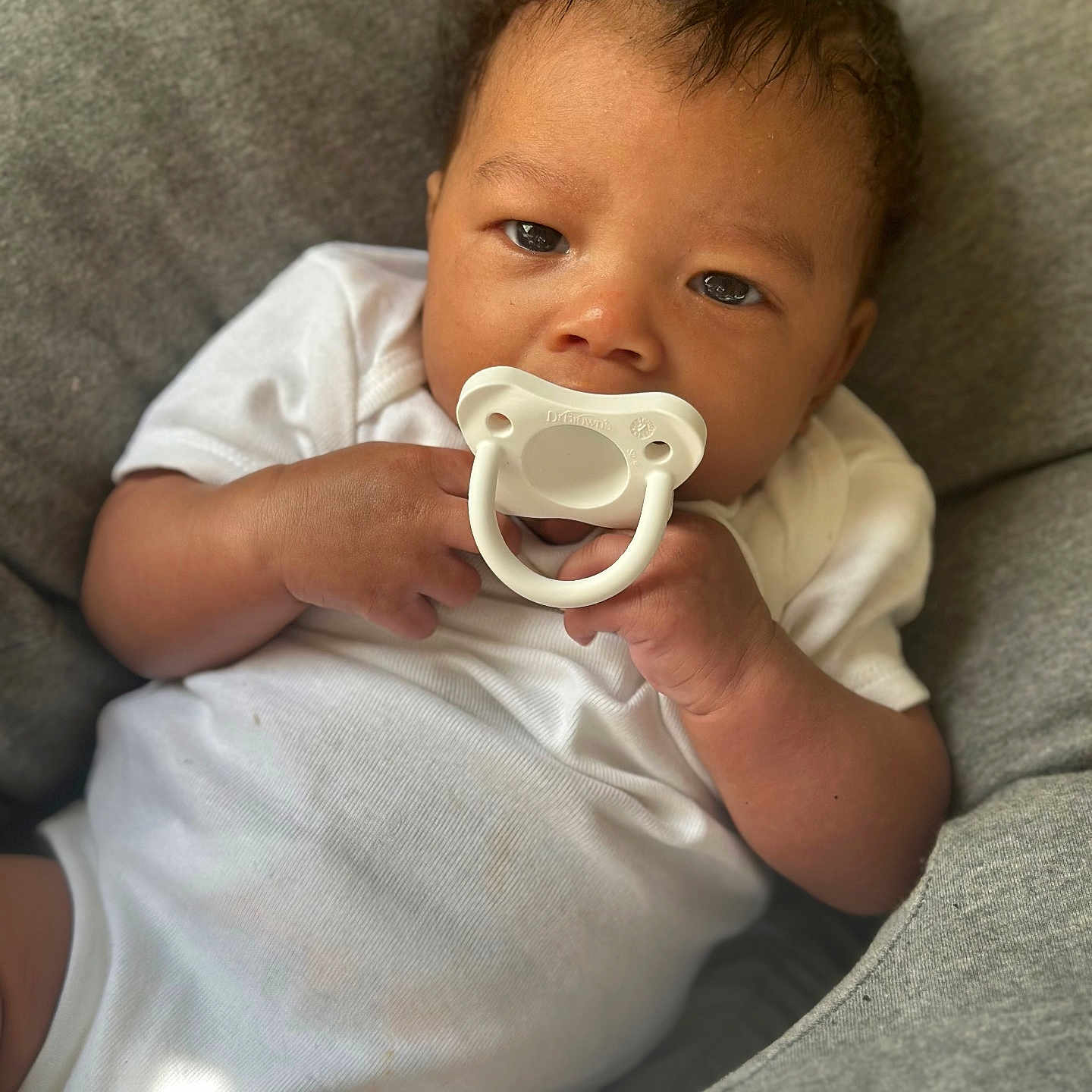 Princeton Monroe is registered to the contest to win money with this photo: baby, beverage, clothing, coffee, coffeecup, couch, cup, cushion, cutlery, face, furniture, head, homedecor, newborn, person, photography, portrait, sitting, sleeping, t_shirt