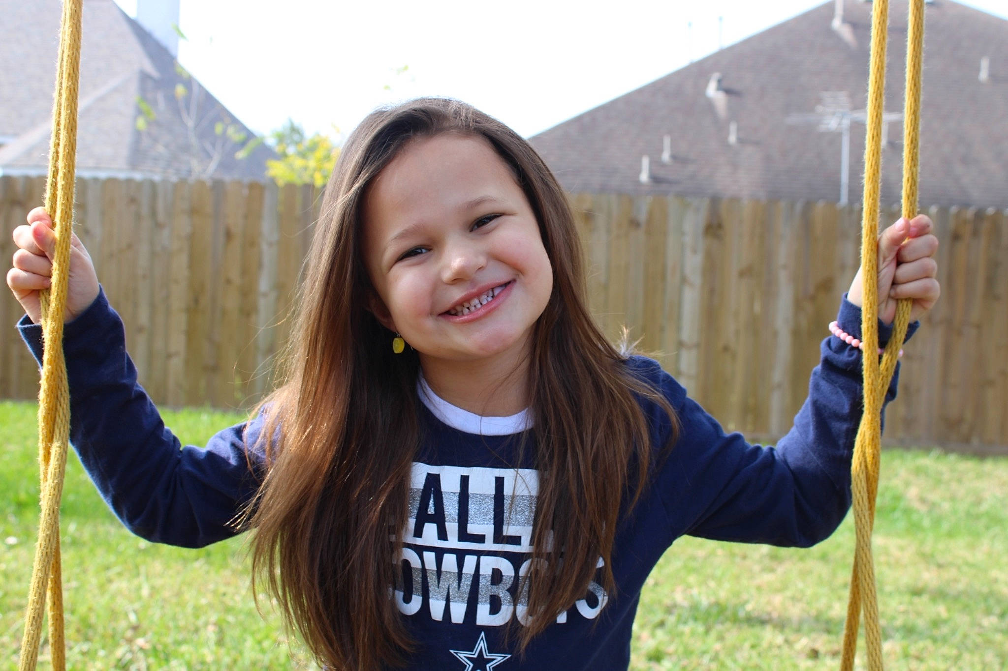 Jayla joined the competition — help win amazing prizes! arm, city, finger, fun, gesture, grass, grass_family, grassland, hand, happy, joy, leisure, natural_environment, outdoor_play_equipment, people_in_nature, person, plant, recreation, smile, swing