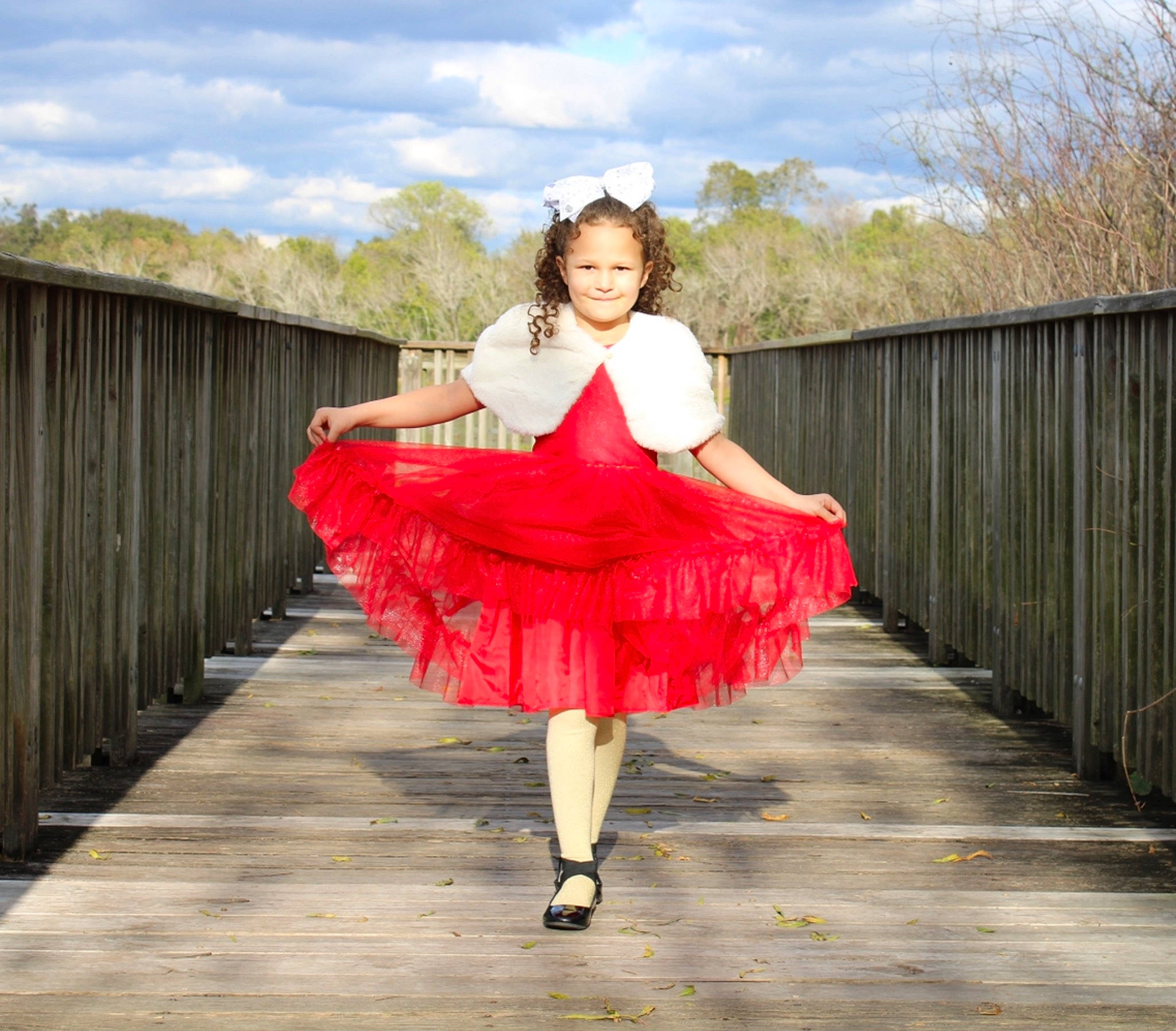 Jayla is registered to the contest to win money with this photo: cloud, dance, dress, entertainment, fashion_design, flash_photography, footwear, formal_wear, grass, happy, human_body, joy, leg, performing_arts, person, plant, sky, standing, street_fashion, tree