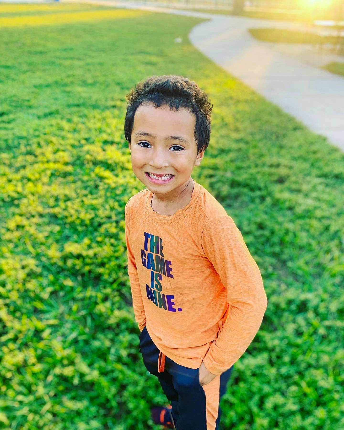 Jace is registered to the contest to win money with this photo: beauty, eye, flash_photography, fun, grass, grass_family, grassland, green, happy, joy, landscape, lawn, leisure, morning, nature, people_in_nature, person, plant, sleeve, smile