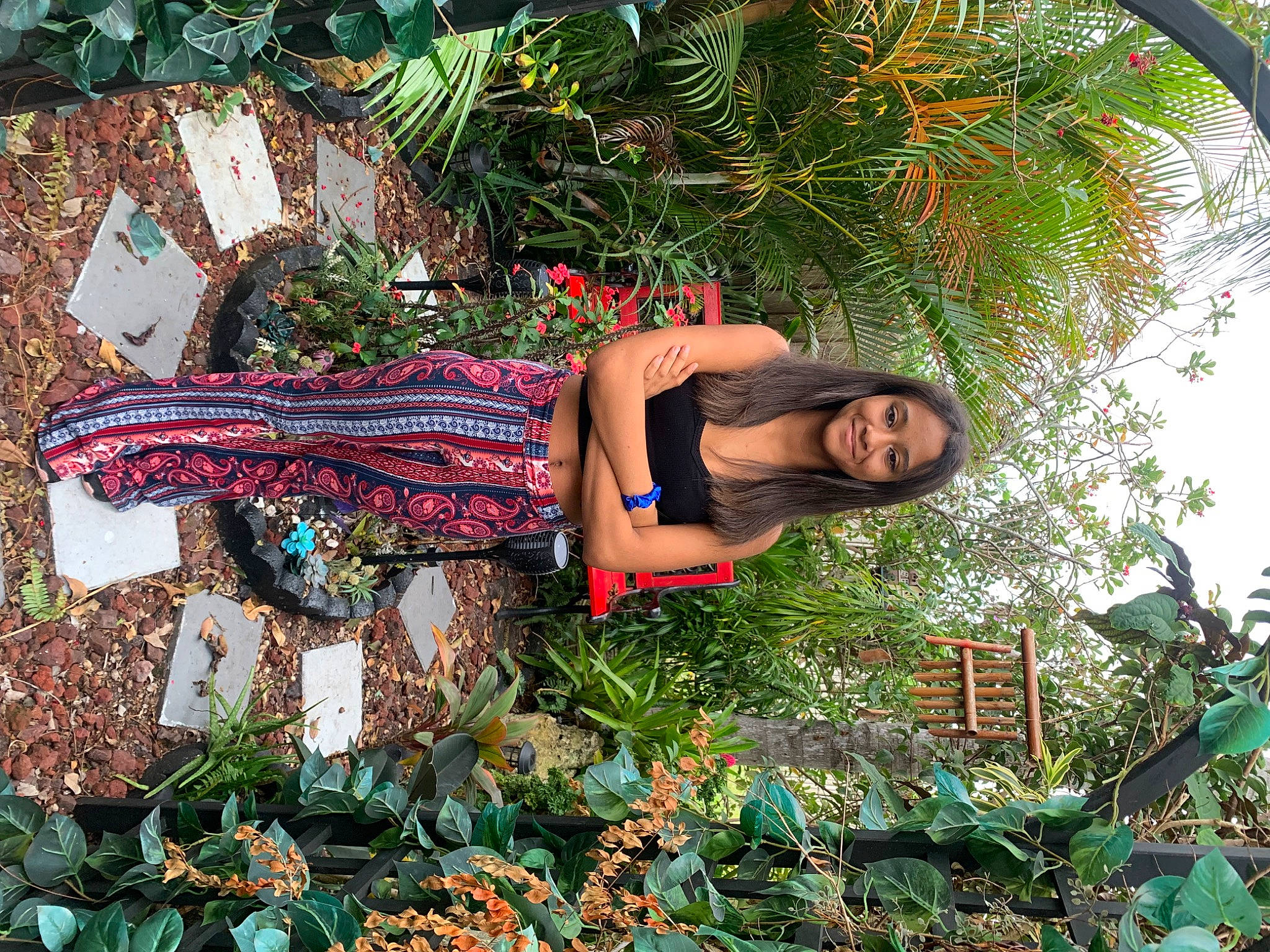 Kaylee is registered to the contest to win money with this photo: arecales, flower, garden, grass, grass_family, groundcover, human_leg, joy, leisure, nature, palm_tree, pattern, people_in_nature, person, plant, shrub, spring, sunglasses, terrestrial_plant, thigh