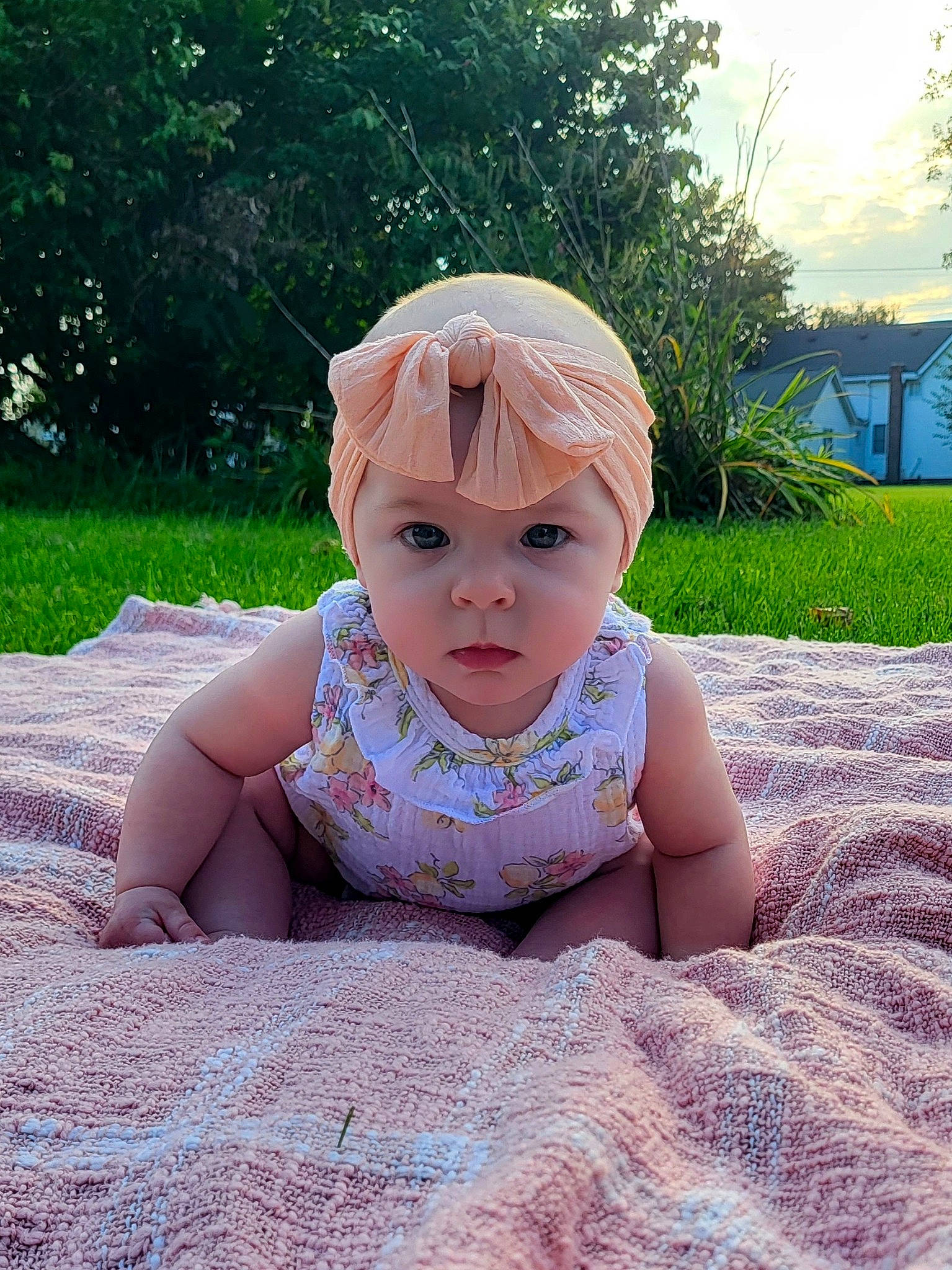 Briella joined the competition — help win amazing prizes! baby, baby_toddler_clothing, child, eye, face, fun, grass, grass_family, happy, head, leisure, people_in_nature, person, pink, plant, recreation, sky, sleeve, sunlight, toddler