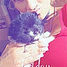 Nala joined the competition — help win amazing prizes! woman, kitten, cat, selfie, portrait, black_and_white_cat, fluffy, pet, holding, cuddling, closeup, indoors, pink, purple, filtered, jewelry, nose_ring, red_clothing, hands, text_overlay