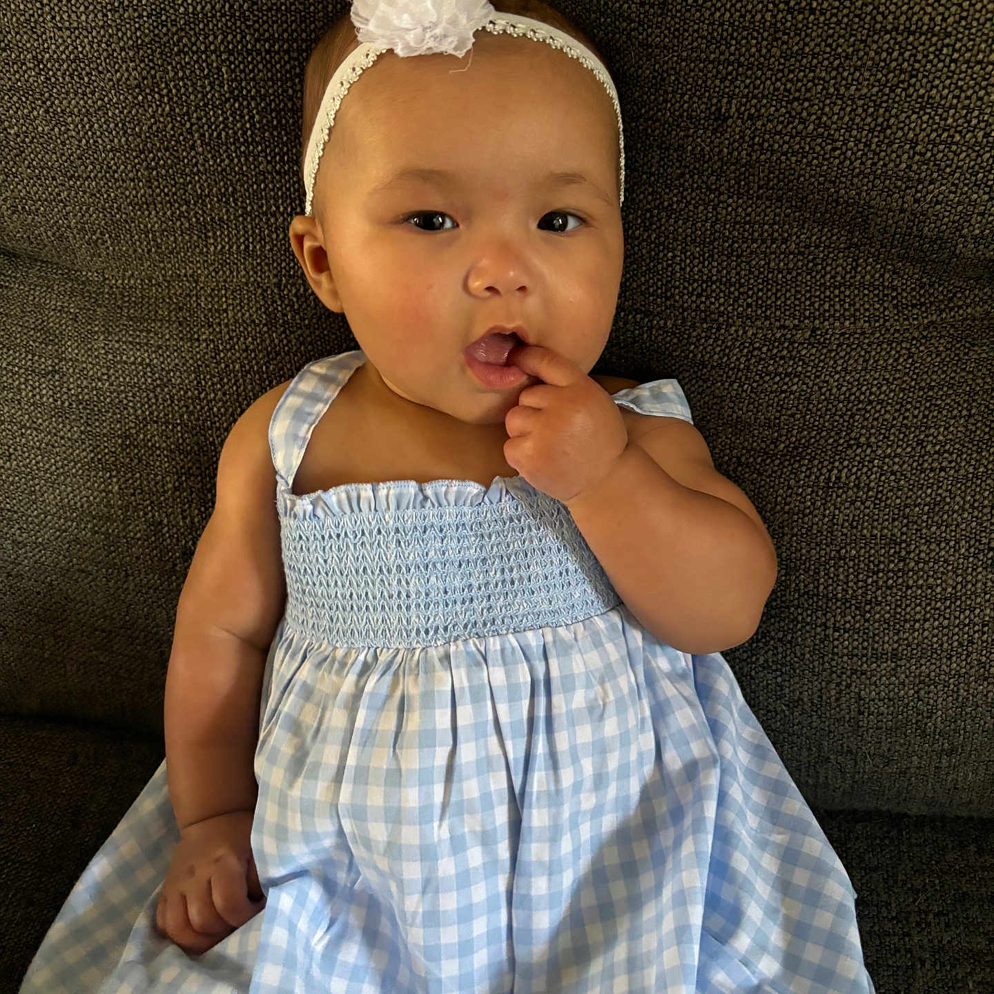 Lovelynn joined the competition — help win amazing prizes! accessories, baby, bodypart, bonnet, clothing, couch, dress, eveningdress, face, finger, formalwear, furniture, hand, hat, head, headband, person, photography, portrait, sitting