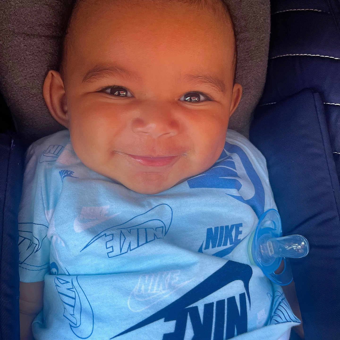 Taiga joined the competition — help win amazing prizes! baby, car, car_interior, carseat, clothing, cushion, face, happy, hat, head, homedecor, newborn, person, photography, portrait, shirt, smile, t_shirt, transportation, vehicle