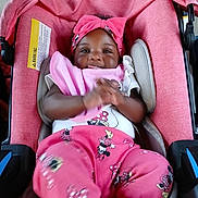 Kreari joined the competition — help win amazing prizes! apparel, baby, car_seat, child, clapping, cushion, cute, happy, headband, headwear, indoors, infant, mickey_mouse, person, pink_clothing, playful, portrait, seat, smiling, young_child