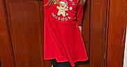 Rosaleen is registered to the contest to win money with this photo: casual, child, door_knob, floor, girl, happy, hardwood_floor, home, indoor, leggings, long_hair, peace_sign, playful, portrait, pose, red_dress, sandals, smile, wooden_door, young