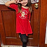 casual, child, door_knob, floor, girl, happy, hardwood_floor, home, indoor, leggings, long_hair, peace_sign, playful, portrait, pose, red_dress, sandals, smile, wooden_door, young