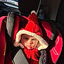David participe au concours pour gagner de l'argent avec cette photo : baby, car_interior, car_seat, child, child_safety, clothing, cute, daylight, expression, fabric, infant, portrait, pouty_face, red_hood, seat_headrest, seatbelt, soft_texture, sunlight, vehicle, window