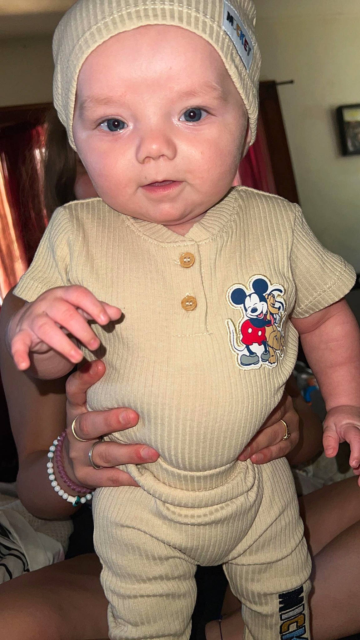Kayson joined the competition — help win amazing prizes! baby_toddler_clothing, cheek, chin, face, facial_expression, gesture, hand, head, human_body, iris, lip, neck, organ, outerwear, person, pink, product, skin, sleeve, standing