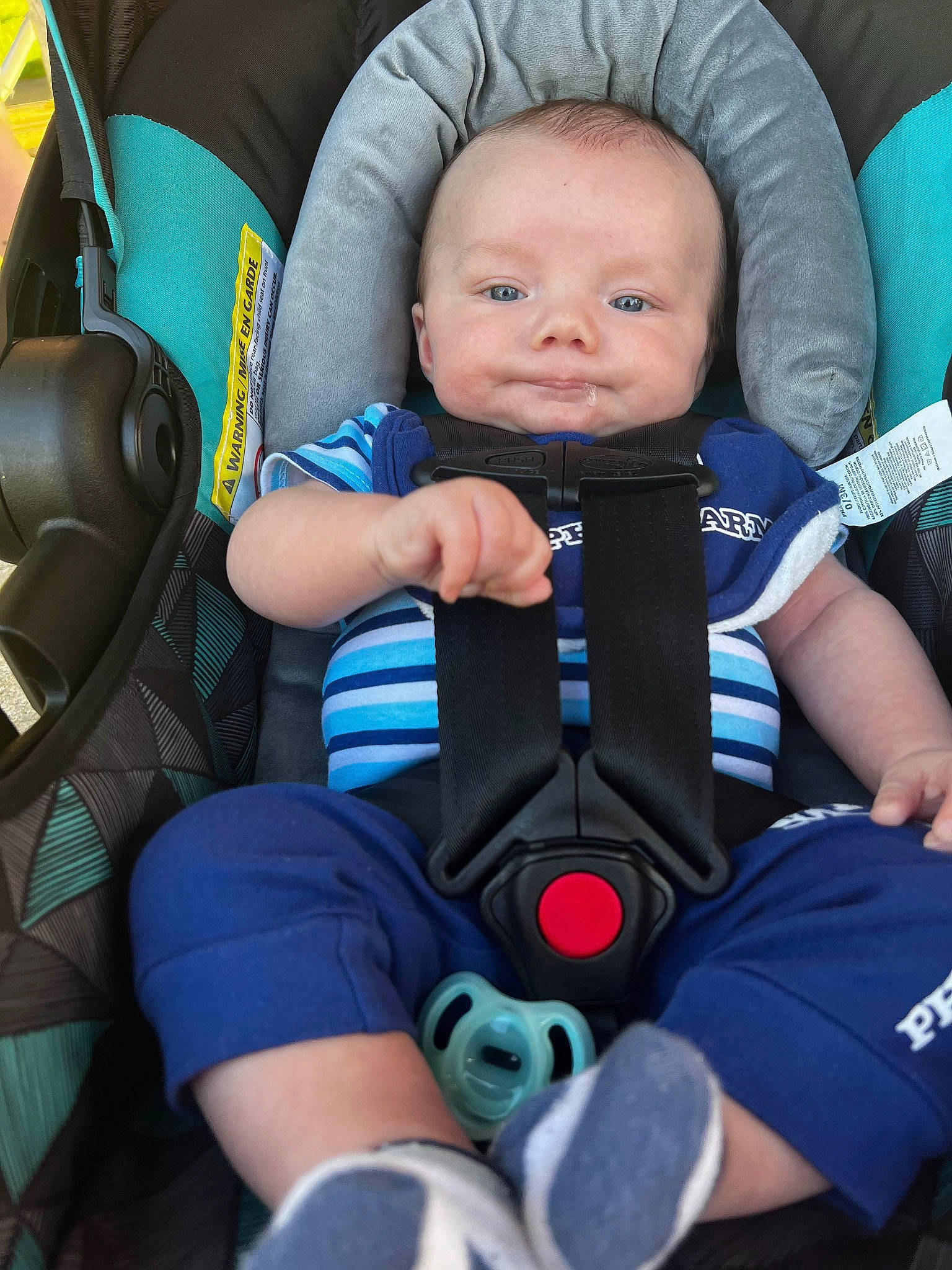 Kayson is registered to the contest to win money with this photo: auto_part, baby, baby_carriage, baby_in_car_seat, baby_products, baby_safety, baby_toddler_clothing, blue, car_seat, car_seat_cover, child, comfort, electric_blue, head_restraint, person, seat_belt, service, sitting, toddler, vacation