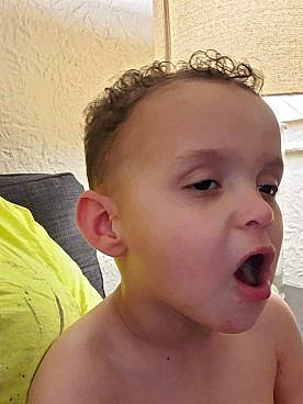 Eli is registered to the contest to win money with this photo: baby, cheek, child, chin, ear, eyebrow, face, facial_expression, forehead, hair, hair_accessory, hairstyle, head, headband, lip, mouth, neck, nose, person, skin