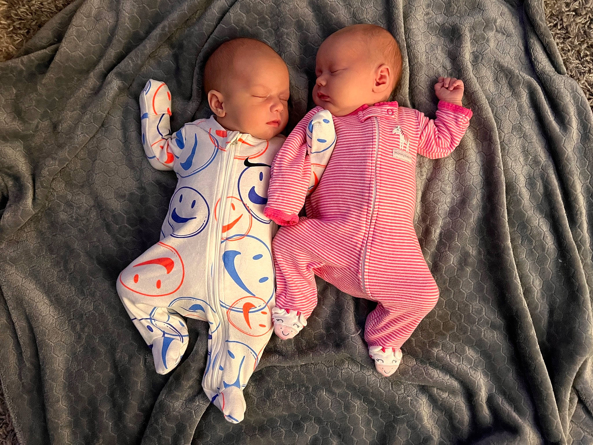 Lucas is registered to the contest to win money with this photo: baby, baby_toddler_clothing, bedding, carmine, cheek, child, comfort, foot, gesture, head, human_body, linens, nail, pattern, person, skin, sleeve, textile, toddler, toy