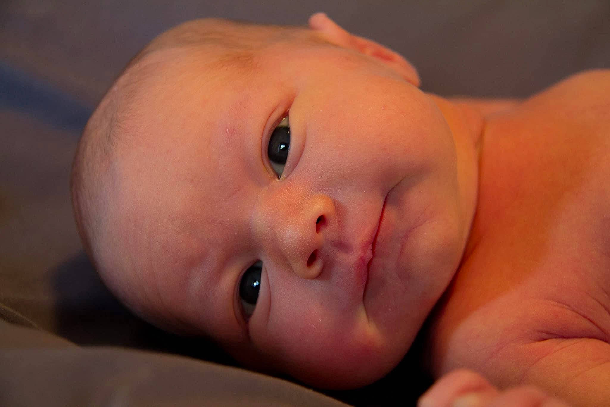 Adeline is registered to the contest to win money with this photo: baby, cheek, ear, eye, eyebrow, eyelash, flash_photography, forehead, gesture, hair, head, human_body, iris, lip, mouth, neck, nose, person, skin, smile