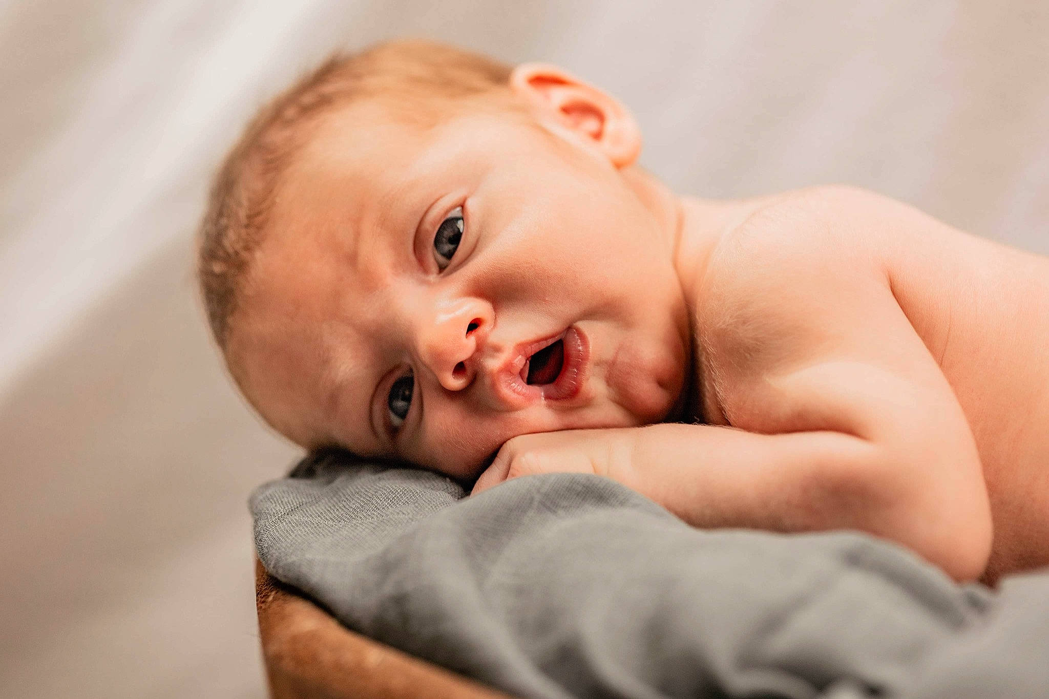 Parker is registered to the contest to win money with this photo: baby, baby_toddler_clothing, cheek, child, close_up, comfort, ear, eyelash, finger, flash_photography, gesture, happy, lip, nail, nose, person, portrait_photography, sitting, skin, thumb