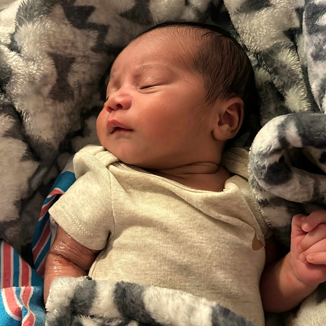 Annalecia joined the competition — help win amazing prizes! baby, bed, blanket, bodypart, clothing, couch, face, finger, furniture, glove, hand, head, homedecor, newborn, person, photography, portrait, quilt, sleeping, towel