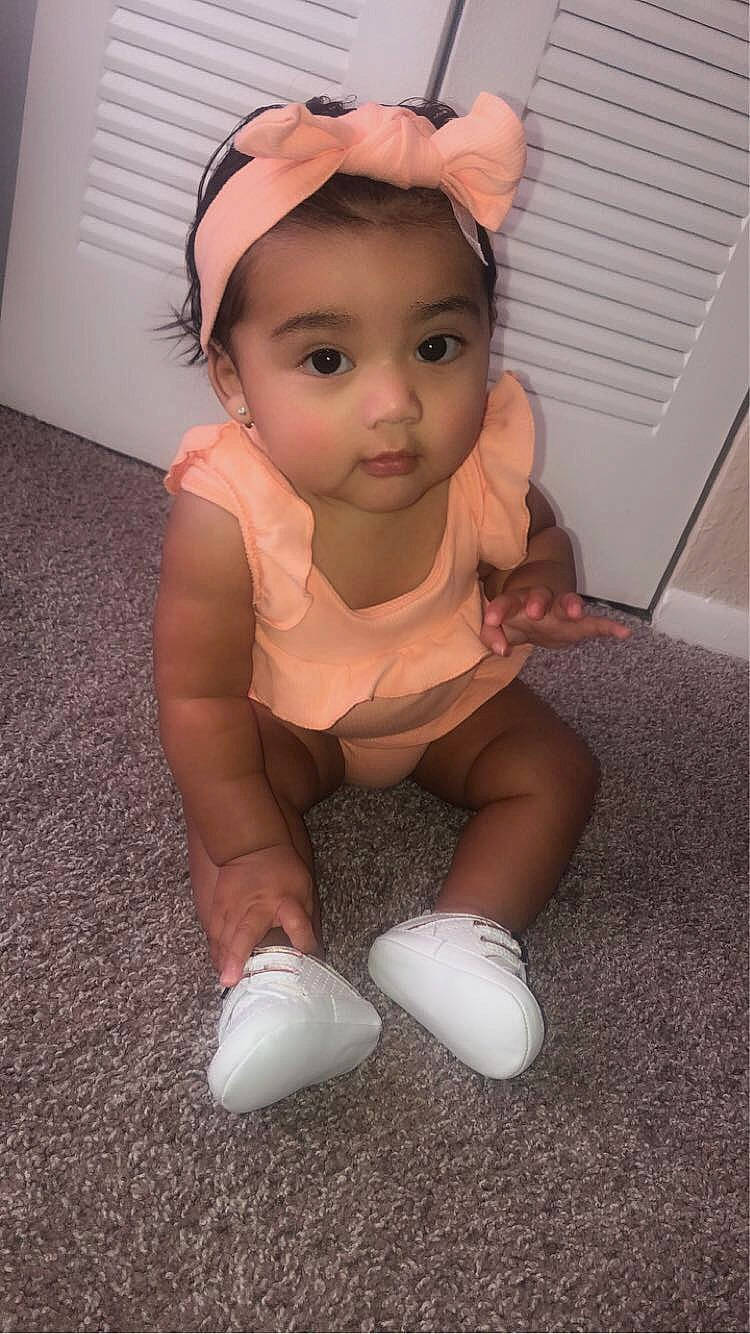 Lianna joined the competition — help win amazing prizes! baby, baby_toddler_clothing, cheek, eyebrow, face, finger, floor, flooring, goggles, head, headband, headgear, headpiece, human_leg, knee, leg, person, pink, sleeve, thigh