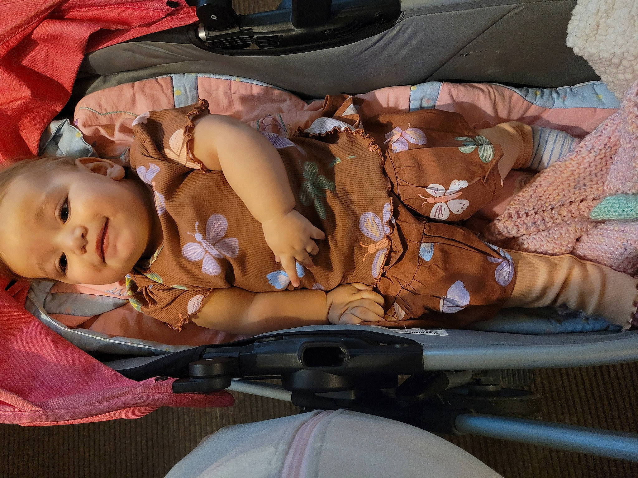 Miracle is registered to the contest to win money with this photo: auto_part, automotive_exterior, baby_carriage, baby_products, car_seat, comfort, fun, hand, human_leg, lap, mammal, motor_vehicle, person, personal_luxury_car, product, smile, toddler, tree, vehicle_door, vertebrate