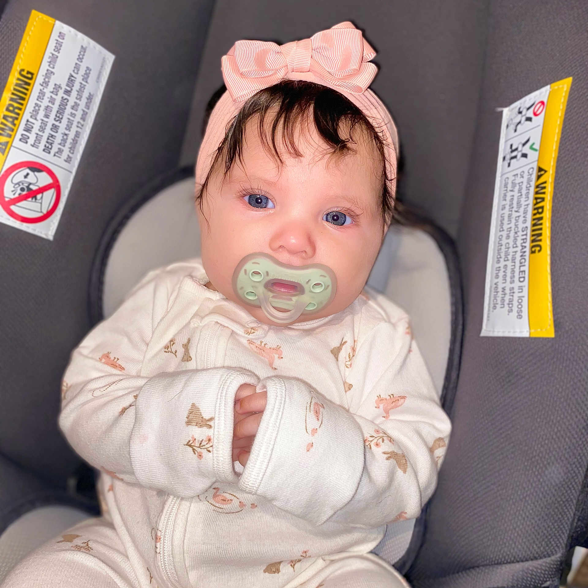 Abbigail joined the competition — help win amazing prizes! baby, bonnet, car, car_interior, carseat, clothing, coat, cushion, face, furniture, hat, head, homedecor, jacket, newborn, person, photography, portrait, transportation, vehicle
