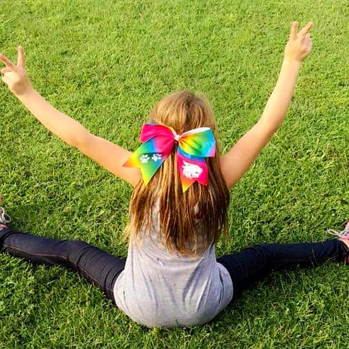 Aubrianna joined the competition — help win amazing prizes! arm, child, facial_expression, fun, grass, grass_family, hand, happy, joint, lawn, leg, leisure, meadow, people_in_nature, photography, plant, play, smile, summer, tree