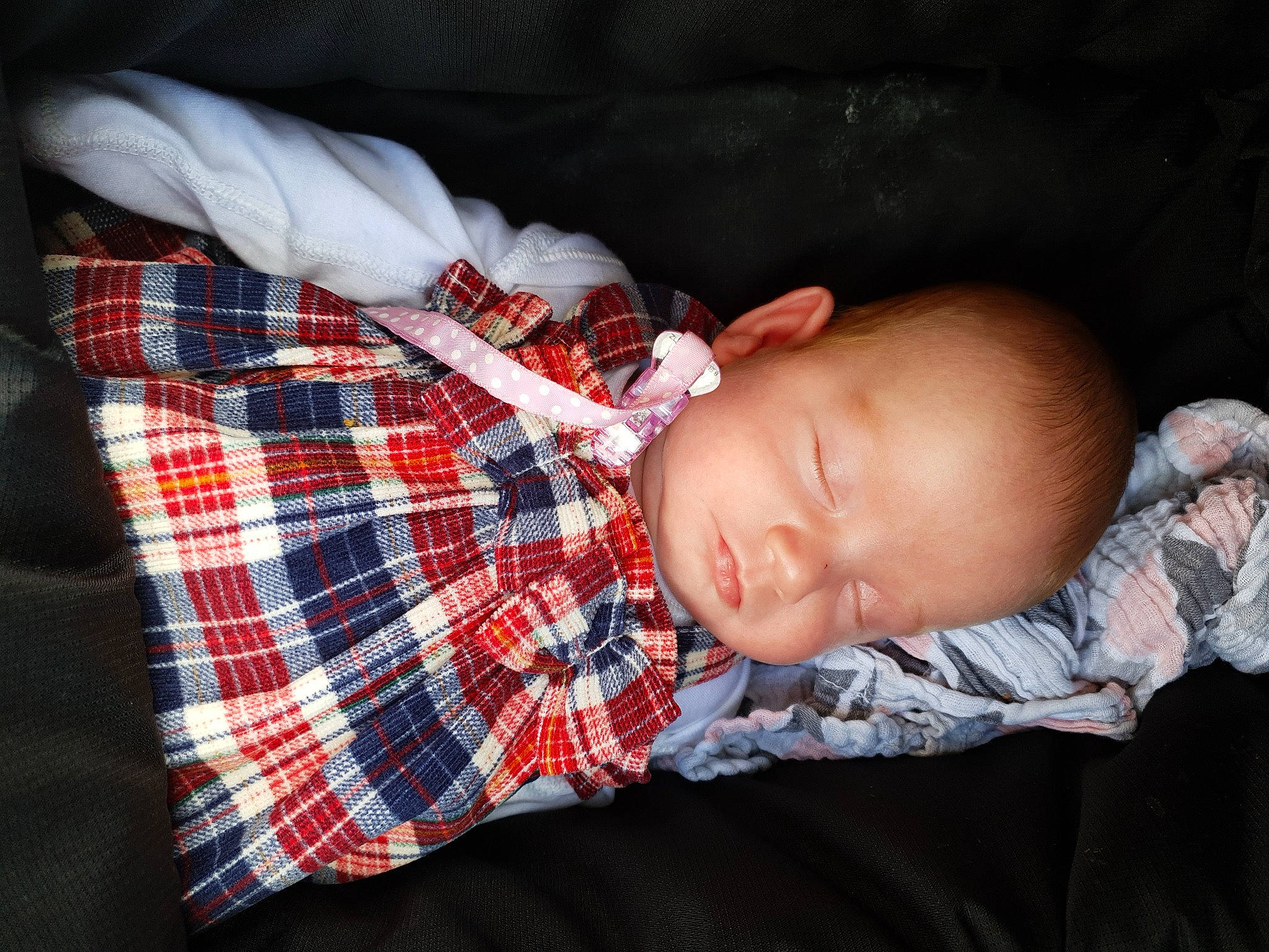Bonnie-rae joined the competition — help win amazing prizes! baby, baby_products, baby_toddler_clothing, bedtime, carmine, cheek, child, comfort, linens, mammal, nap, pattern, person, plaid, room, sitting, skin, sleeve, tartan, textile