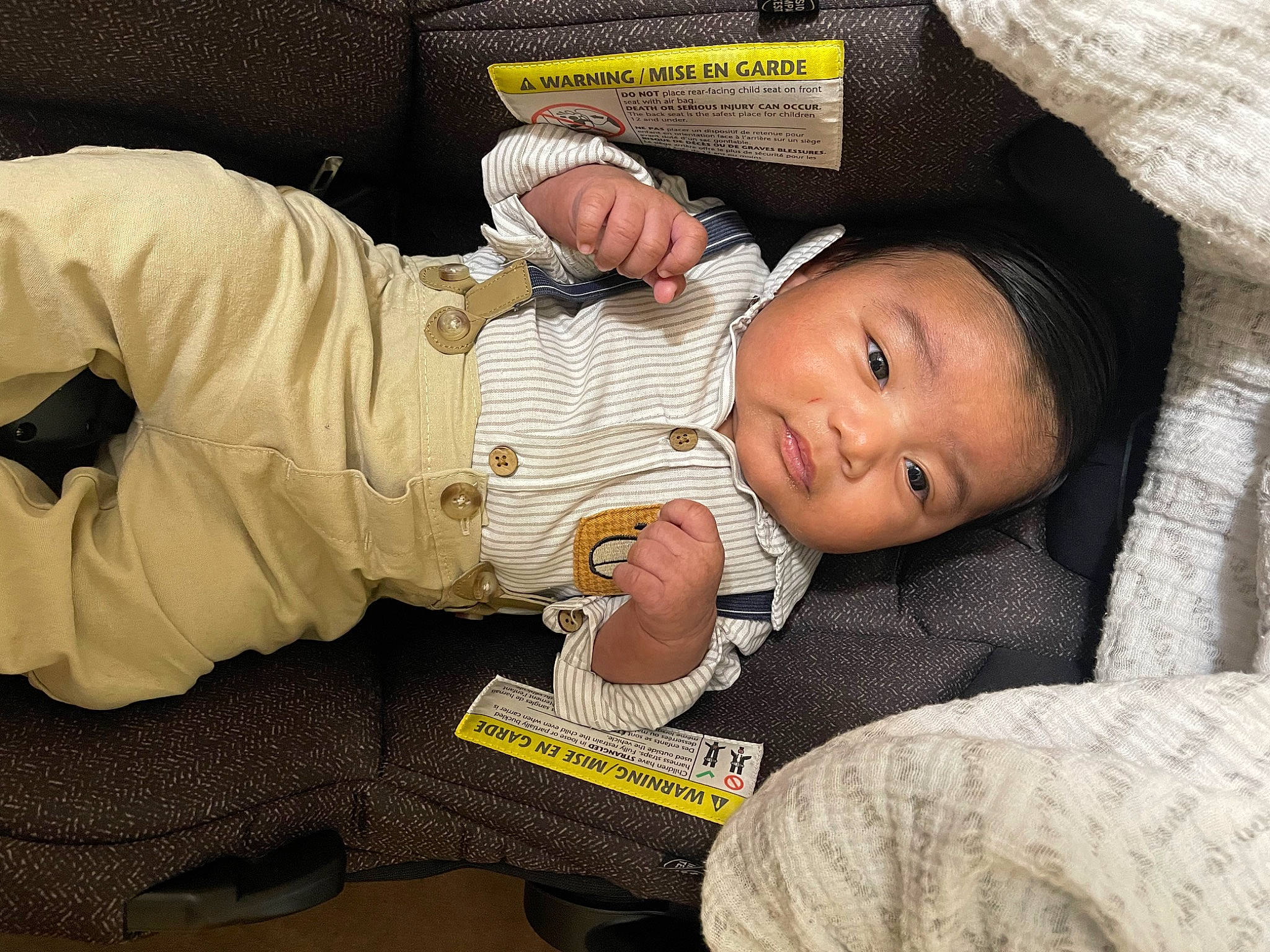 Kylian joined the competition — help win amazing prizes! baby, baby_products, baby_sleeping, baby_toddler_clothing, bedtime, cheek, child, comfort, eye, finger, hand, lap, leg, linens, nap, person, sitting, sleeve, thumb, toddler