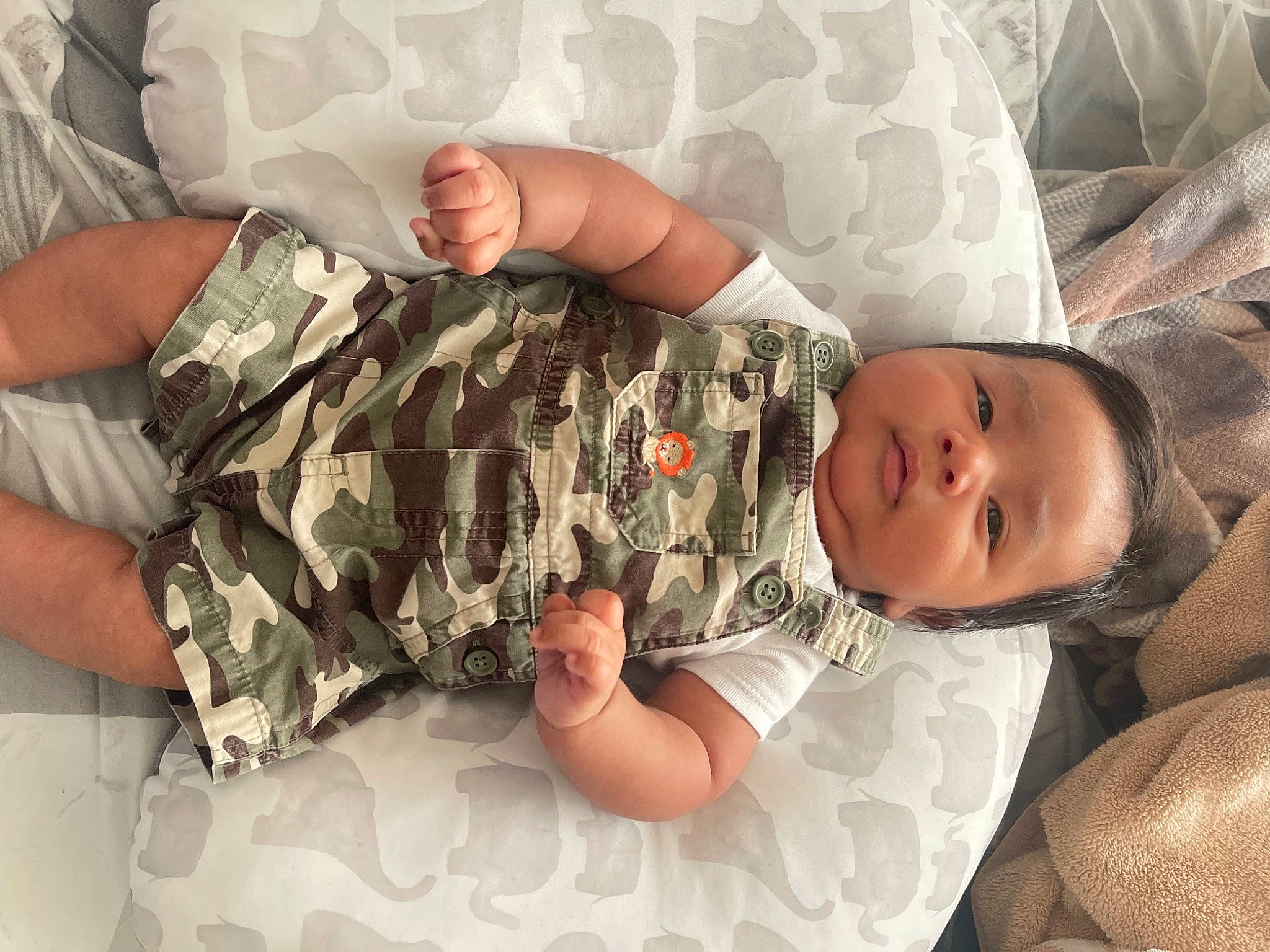 Kylian joined the competition — help win amazing prizes! arm, baby, baby_sleeping, baby_toddler_clothing, camouflage, child, comfort, eye, finger, gesture, hand, human_body, joint, leg, linens, military_camouflage, person, skin, sleeve, toddler