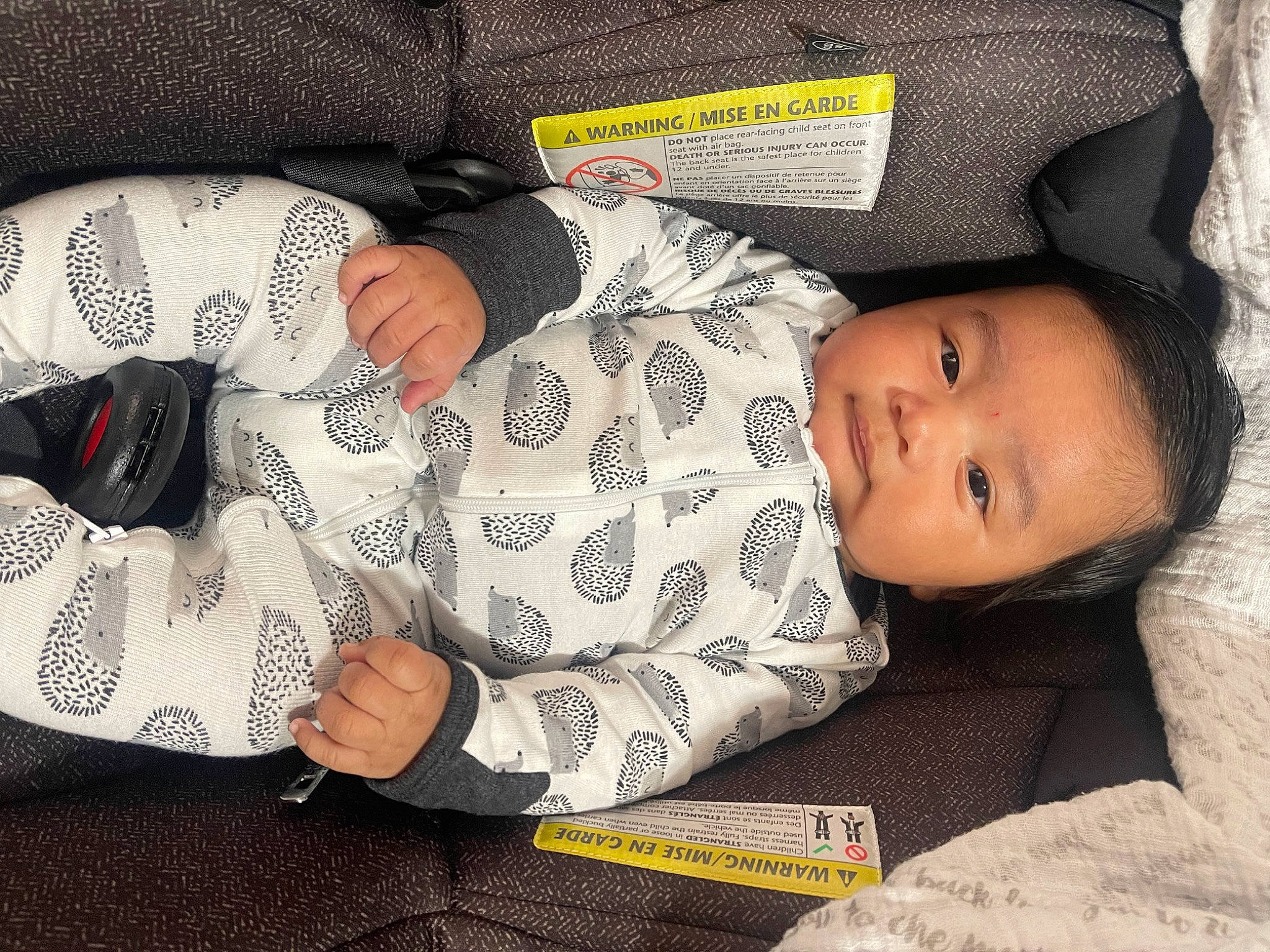Kylian joined the competition — help win amazing prizes! arm, baby, baby_sleeping, baby_toddler_clothing, carmine, child, comfort, cool, facial_expression, finger, linens, mouth, nose, pattern, person, skin, sleeve, smile, textile, toddler