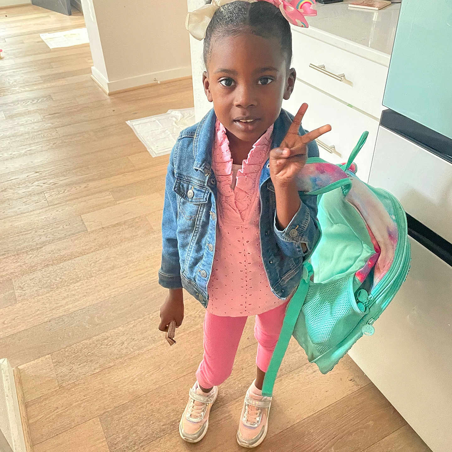 Adara joined the competition — help win amazing prizes! backpack, blackhair, child, clothing, face, female, footwear, girl, hair, head, person, racket, shoe, sitting, sleeve, sport, standing, student, tennis, tennisracket
