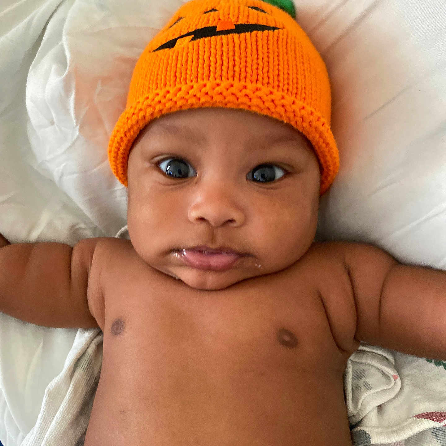 Craig joined the competition — help win amazing prizes! baby, beanie, bed, bodypart, bonnet, cap, clothing, face, finger, furniture, glove, hand, hat, head, newborn, person, photography, portrait, skin, tattoo