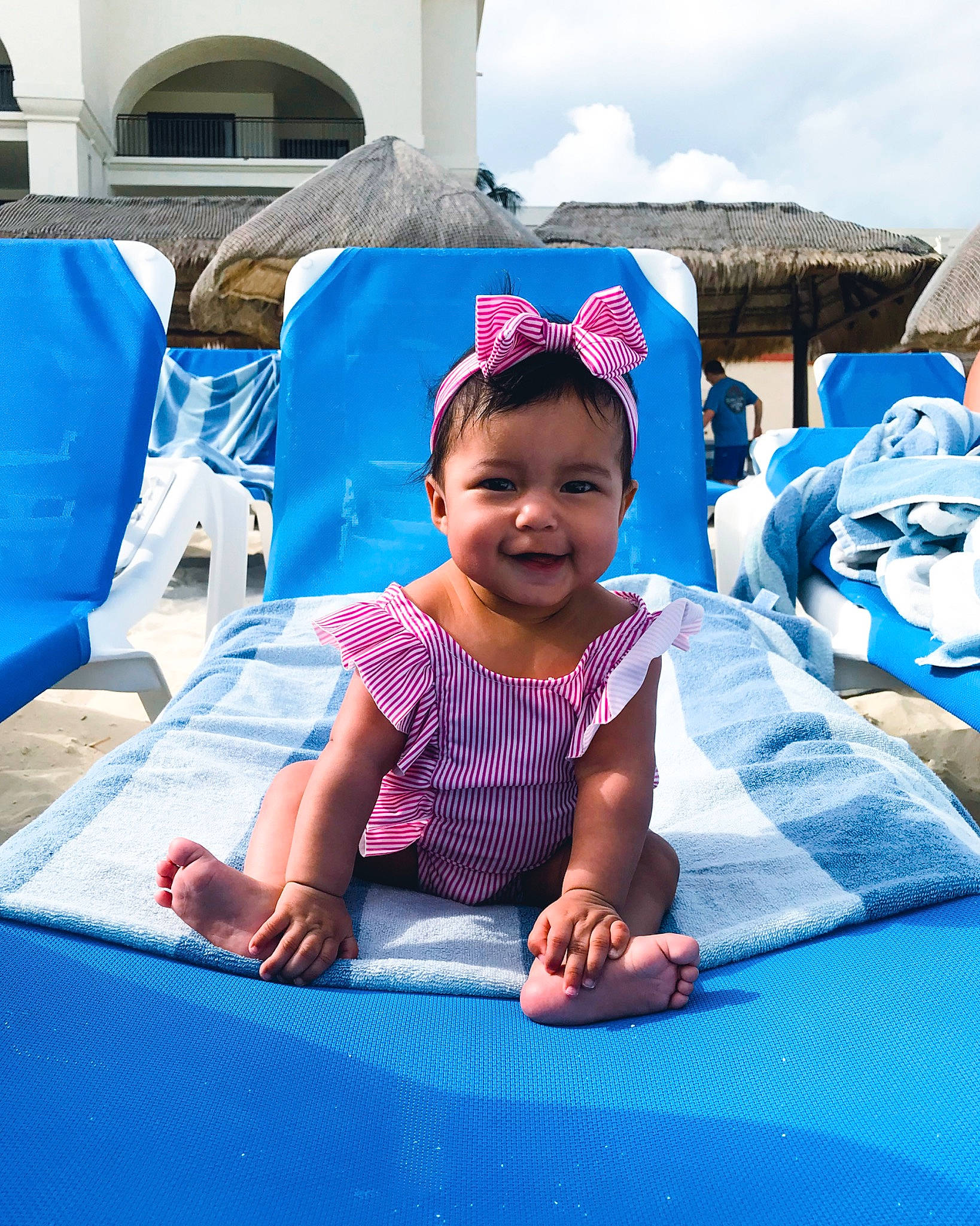 Jael joined the competition — help win amazing prizes! baby, blue, child, fun, games, joy, leisure, people, person, play, recreation, smile, summer, swimming_pool, toddler, vacation, water