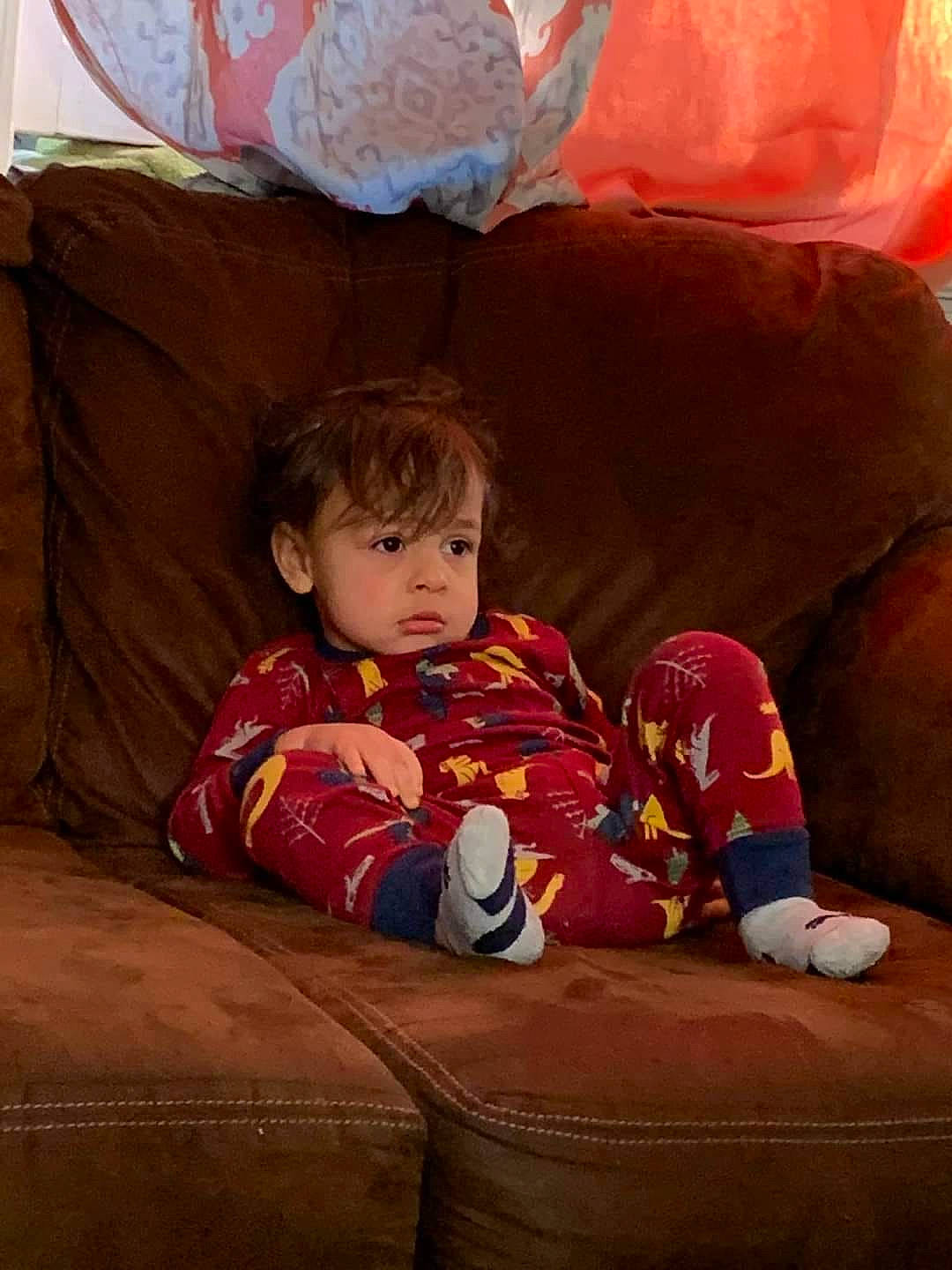 Jakob is registered to the contest to win money with this photo: baby, baby_toddler_clothing, child, comfort, eye, face, flooring, fun, happy, head, human_body, lap, leisure, person, play, room, sitting, tints_and_shades, toddler, tree