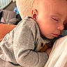 baby, sleeping, child, cozy, grey_sweater, person, closeup, nap, peaceful, infant, cute, soft, warm, indoor, resting, head, face, skin, comfort, hug