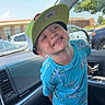 Denver joined the competition — help win amazing prizes! child, boy, smiling, cap, hat, blue_clothing, dinosaur_pattern, car_interior, car_seat, window, parking_lot, trees, daylight, happy, portrait, casual, young, cute, vehicle, seat
