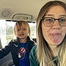 Denver joined the competition — help win amazing prizes! child, woman, car_interior, glasses, tongue_piercing, star_jewel, seat_headrest, casual_clothing, window, daylight, blonde_hair, smile, portrait, family, fun, vehicle, seat, young_child, indoor, people