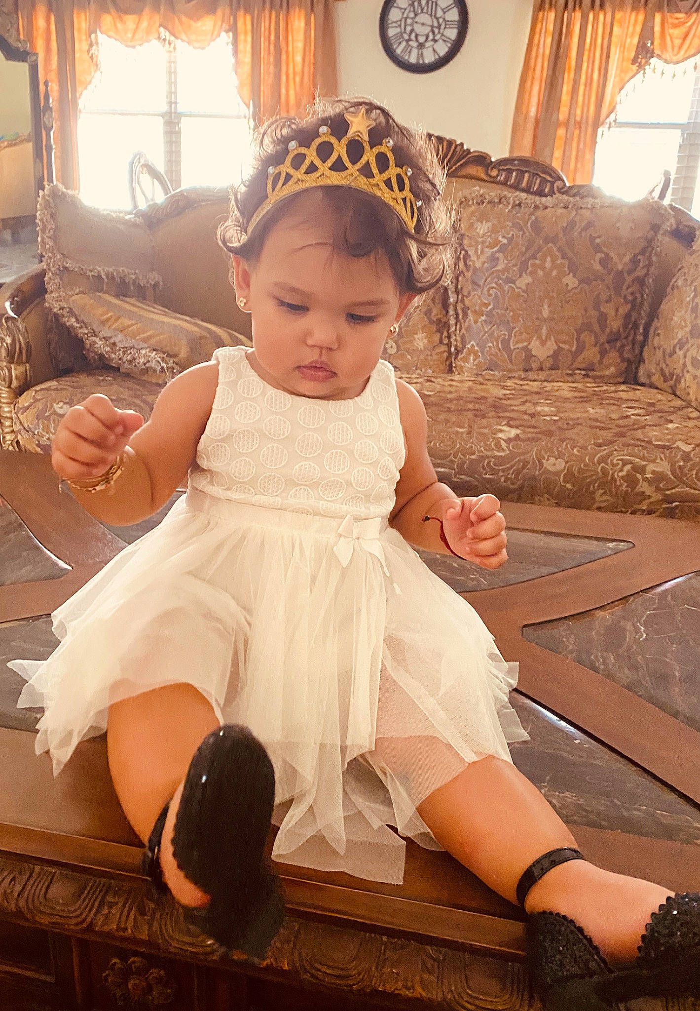 Brittany joined the competition — help win amazing prizes! child, dress, hair_accessory, headgear, headpiece, person, sitting, toddler