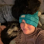 Dolly Bear joined the competition — help win amazing prizes! animal, casual, clothing, comfort, companion, couch, cozy, dog, friendship, fur, happy, headband, home, indoor, person, pet, portrait, relaxing, smile, snuggle