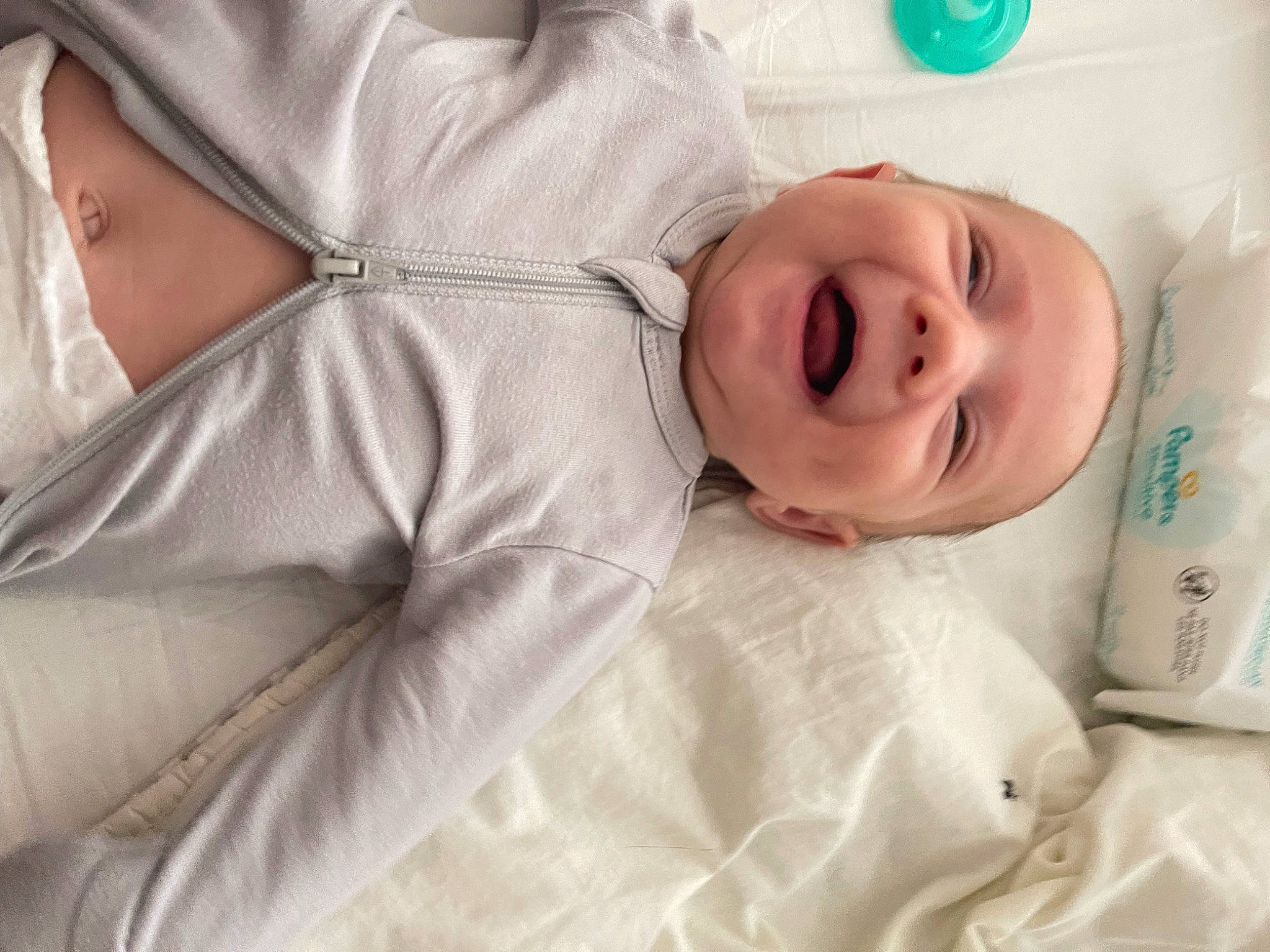 Christian is registered to the contest to win money with this photo: baby, baby_products, baby_sleeping, baby_toddler_clothing, bed, bed_sheet, bedding, bedtime, child, comfort, event, linens, nap, person, room, skin, sleep, sleeve, smile, textile