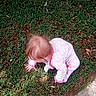 baby, barefoot, casual_clothing, child, crawling, curious, daylight, exploring, grass, greenery, hair, head, infant, nature, outdoor, pajamas, person, sidewalk, toddler, young_child