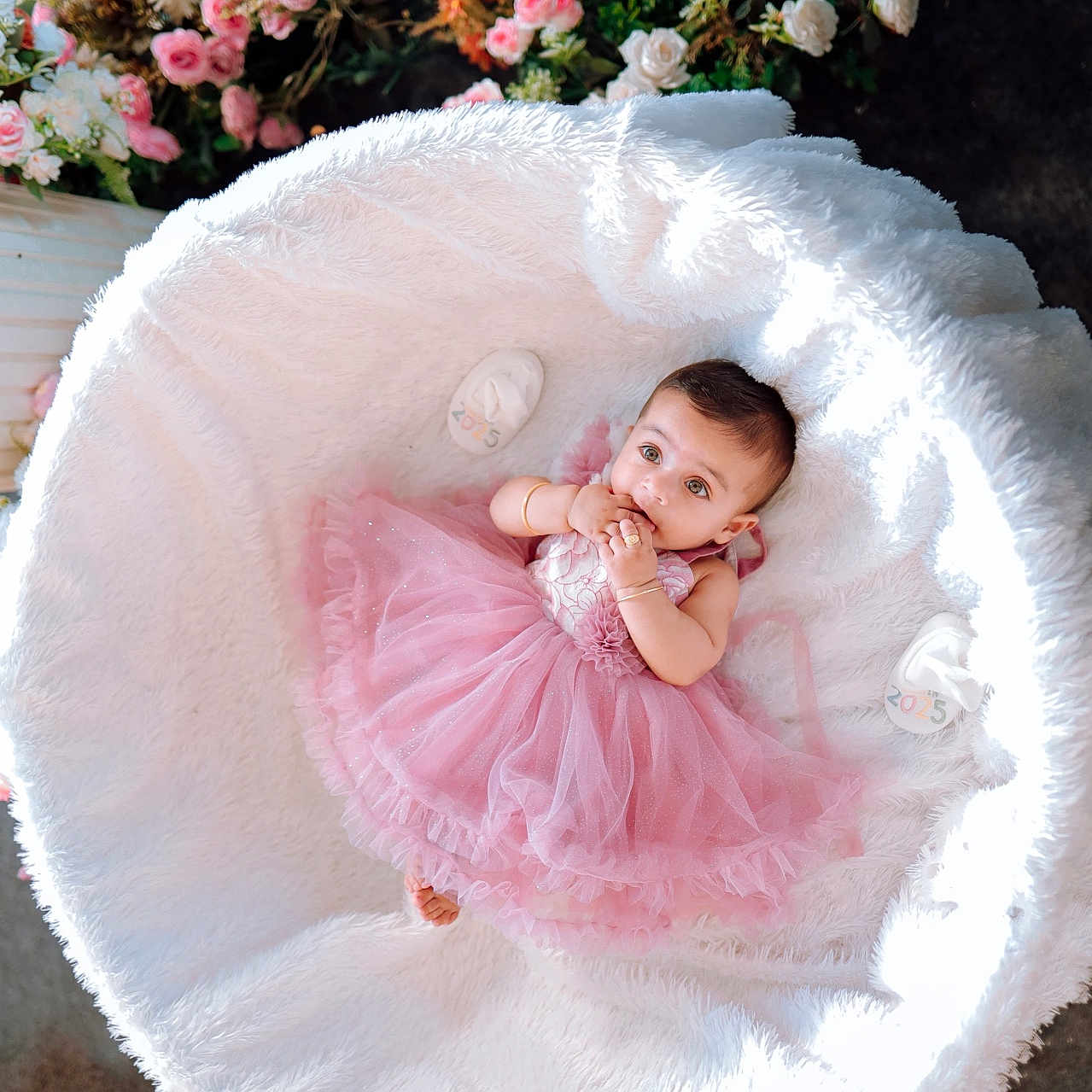 Wilbea is registered to the contest to win money with this photo: adorable, baby, basket, child, cozy, curious_look, cute, decor, flowers, fluffy_blanket, indoor, infant, lying_down, pastel_colors, peaceful, pink_dress, portrait, small_hands, soft_texture, toddler