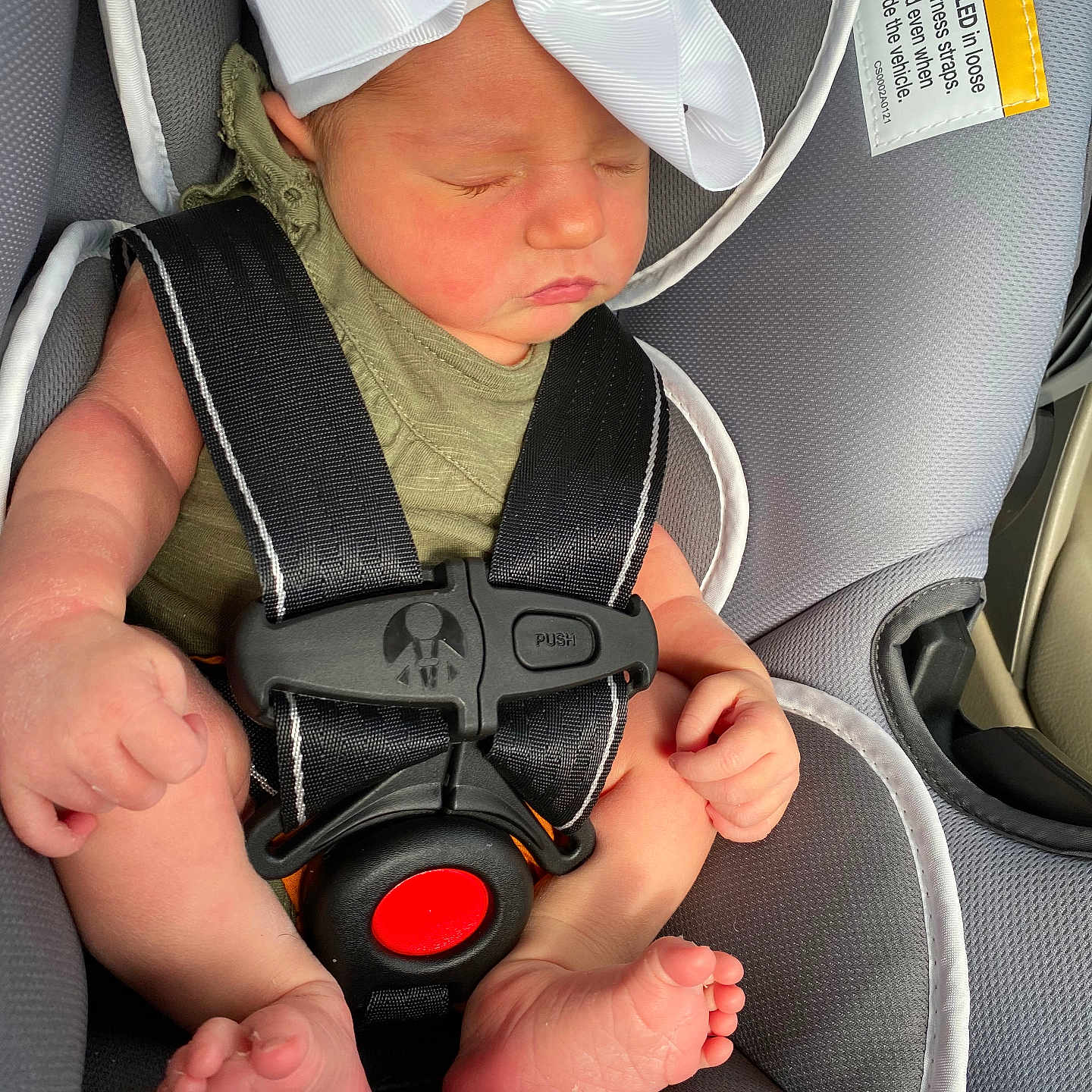 Ava joined the competition — help win amazing prizes! accessories, baby, belt, bodypart, car, car_interior, carseat, clothing, cushion, face, finger, hat, head, homedecor, person, photography, portrait, sleeping, transportation, vehicle